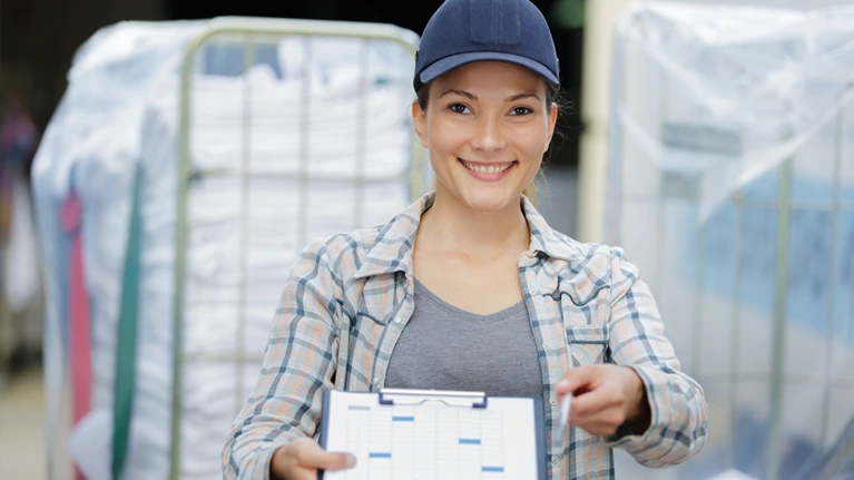 female laundry delivery worker